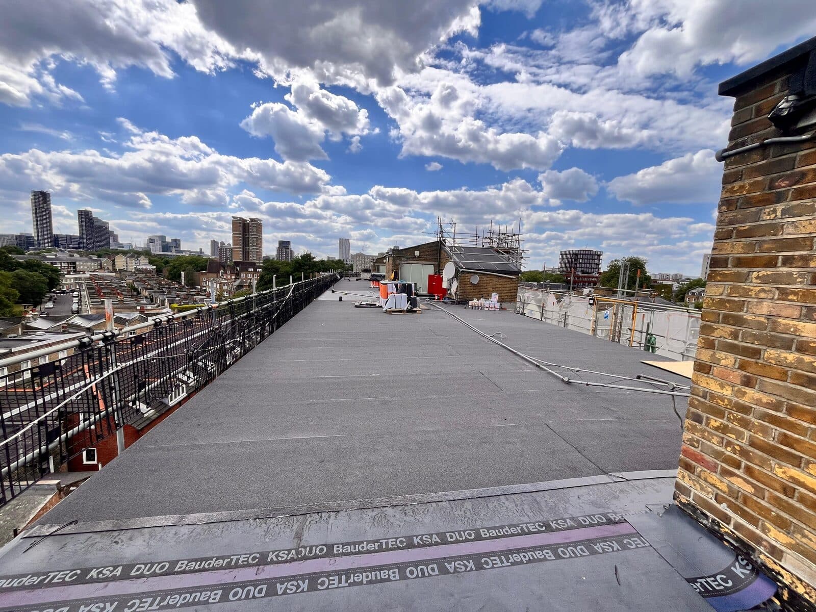 Finished Bauder roof viewed along the parapet