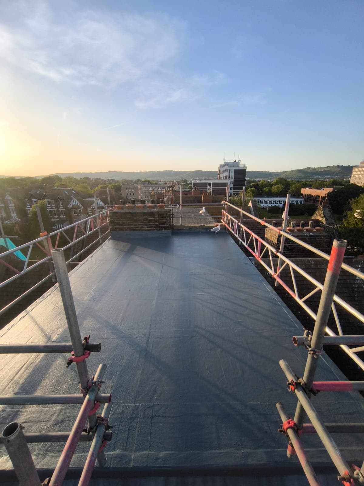 Flat roof after dark PMMA waterproofing