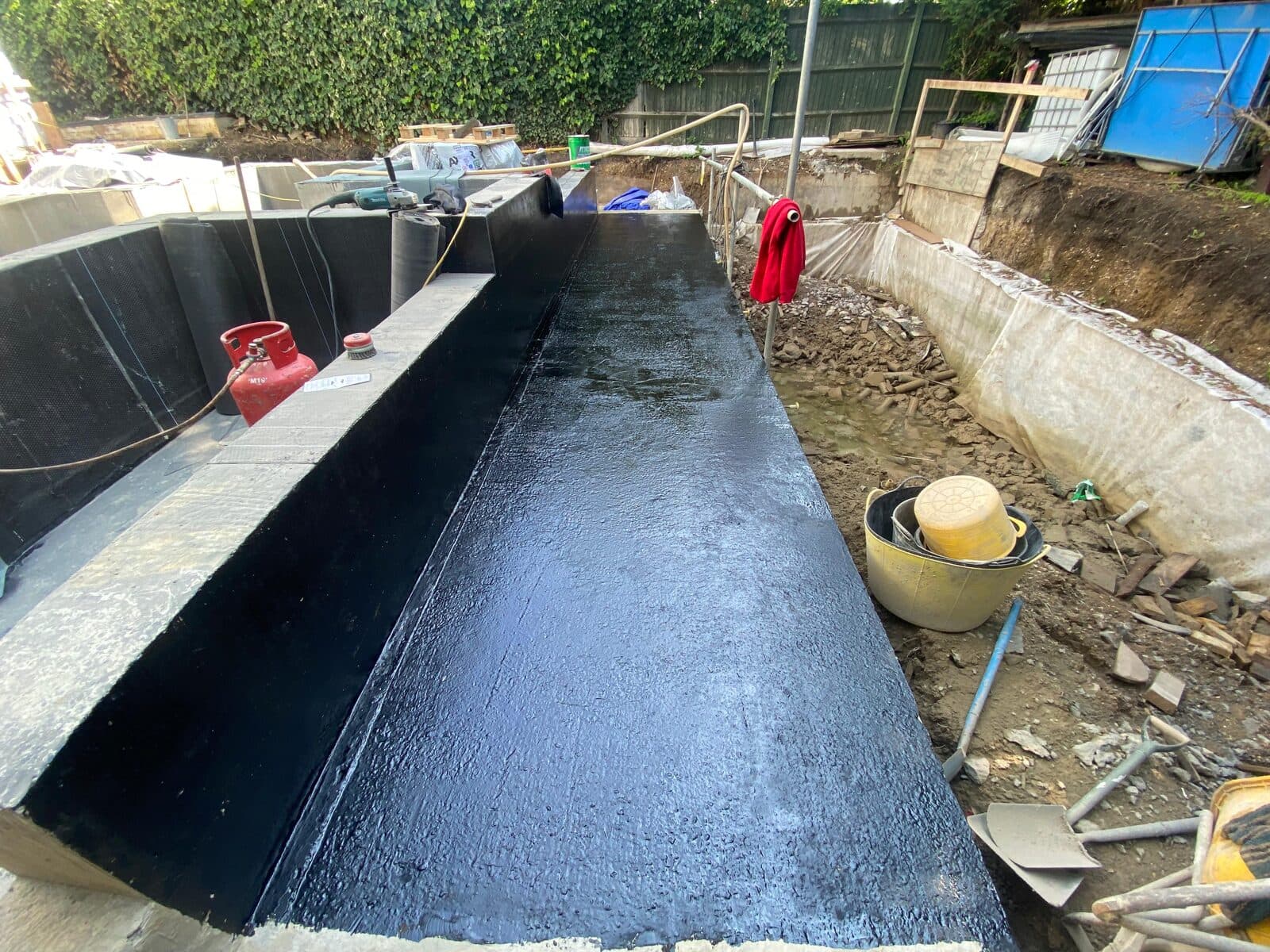 Black waterproof coating applied to the structure