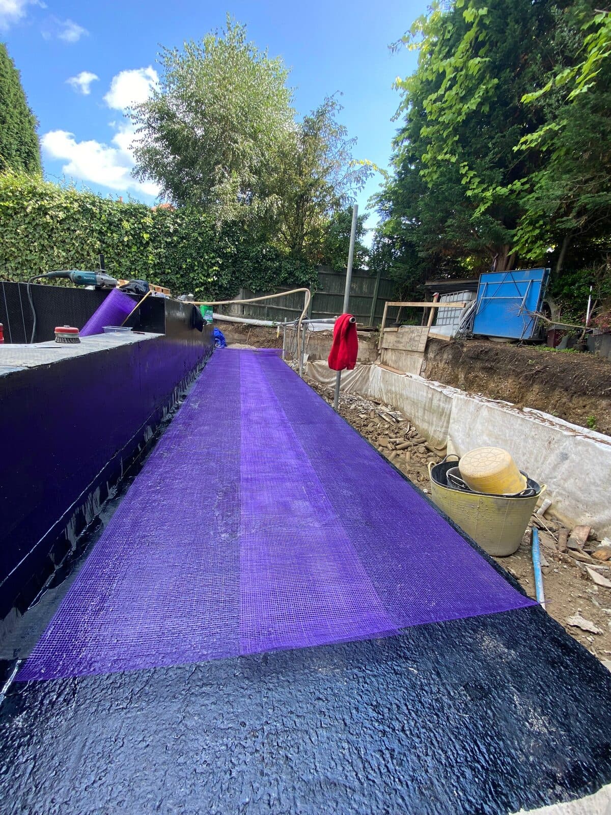 Protective layer installed over waterproofing